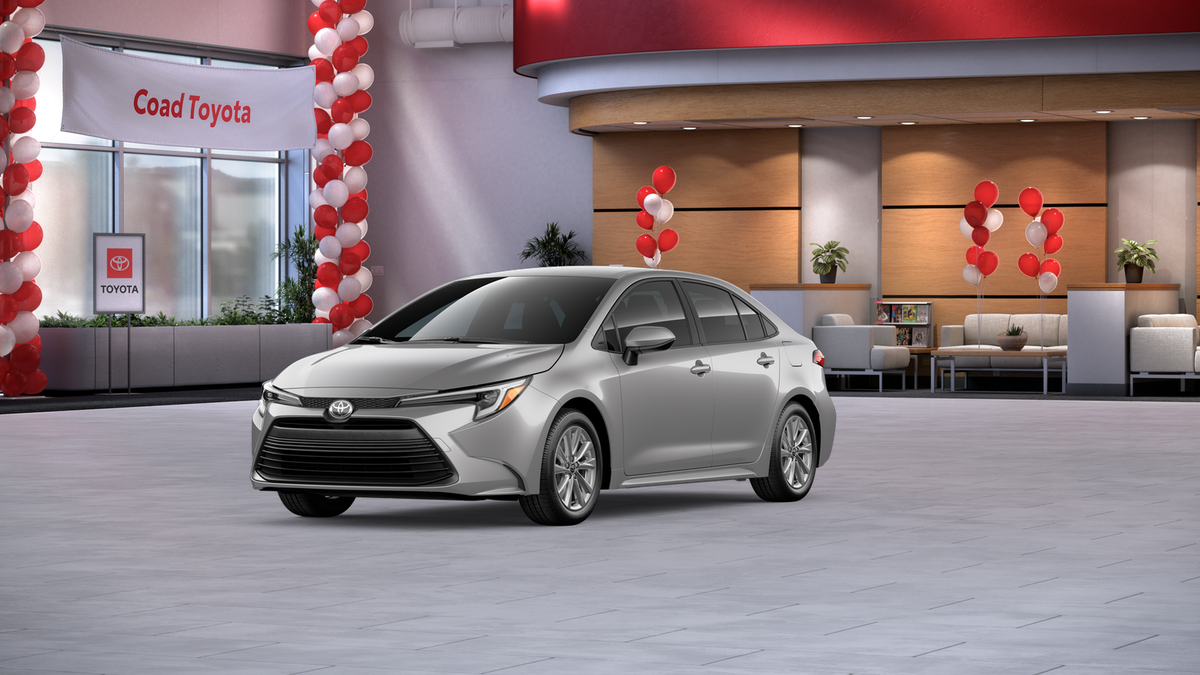 2026 Toyota Corolla Hybrid LE in Classic Silver Metallic — front three-quarter view